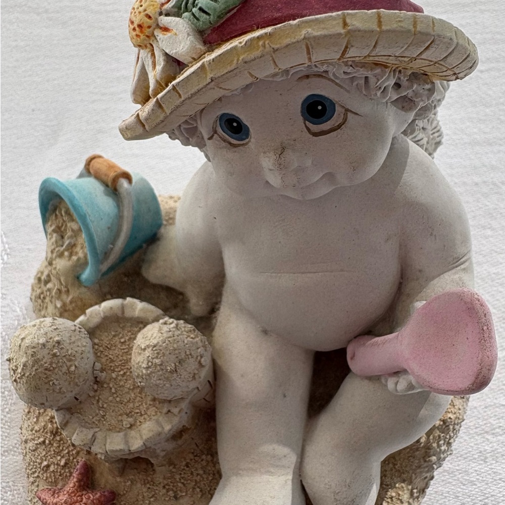 Beach-Themed Cherub Figurine with Hat